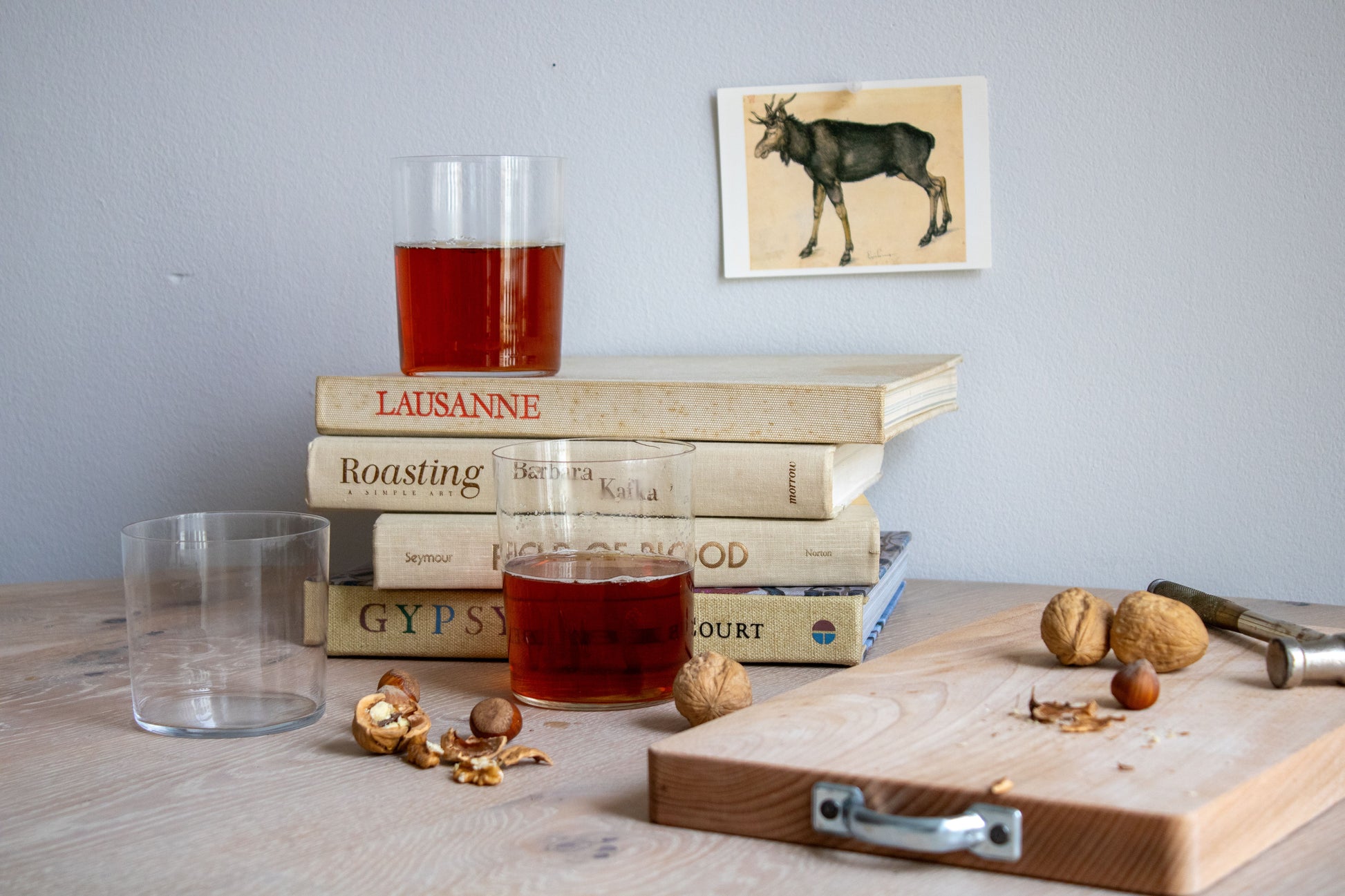 Two glasses of cider on books