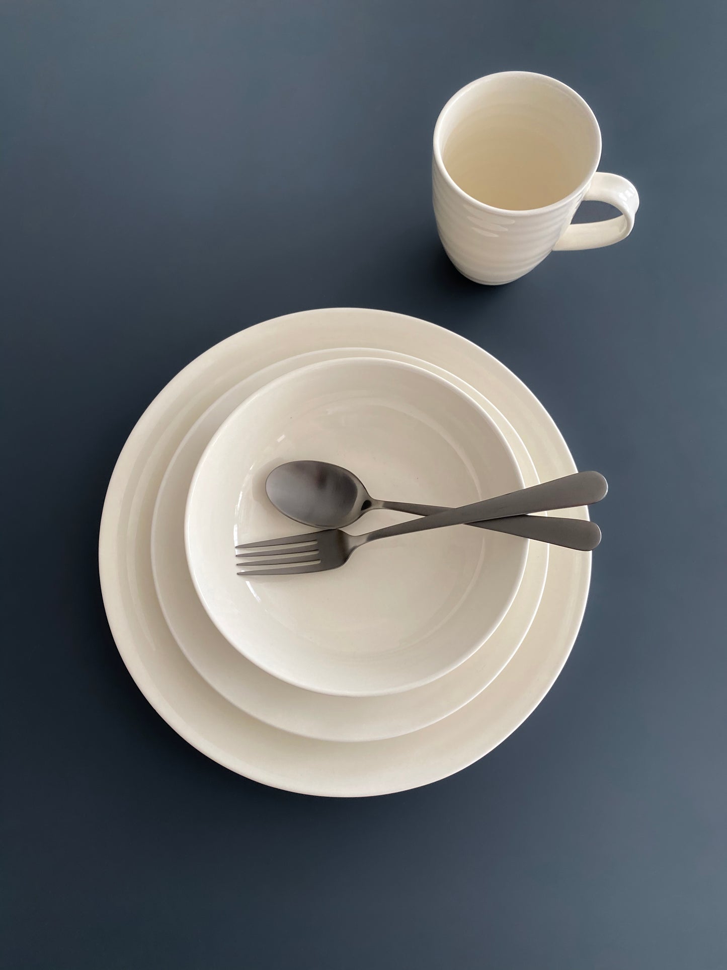 Daniel Smith Mug - Set of 4 - Ivory Canvas Home canvas home, contemporary dinnerware, Daniel Smith, Daniel Smith Collection, dinner party, dinnerware, dinnerware sets, dish sets, family, Ivory, Large, modern dinnerware, Mug, mugs & cups, Place Setting, Plates, simple dinnerware, tabletop, tableware