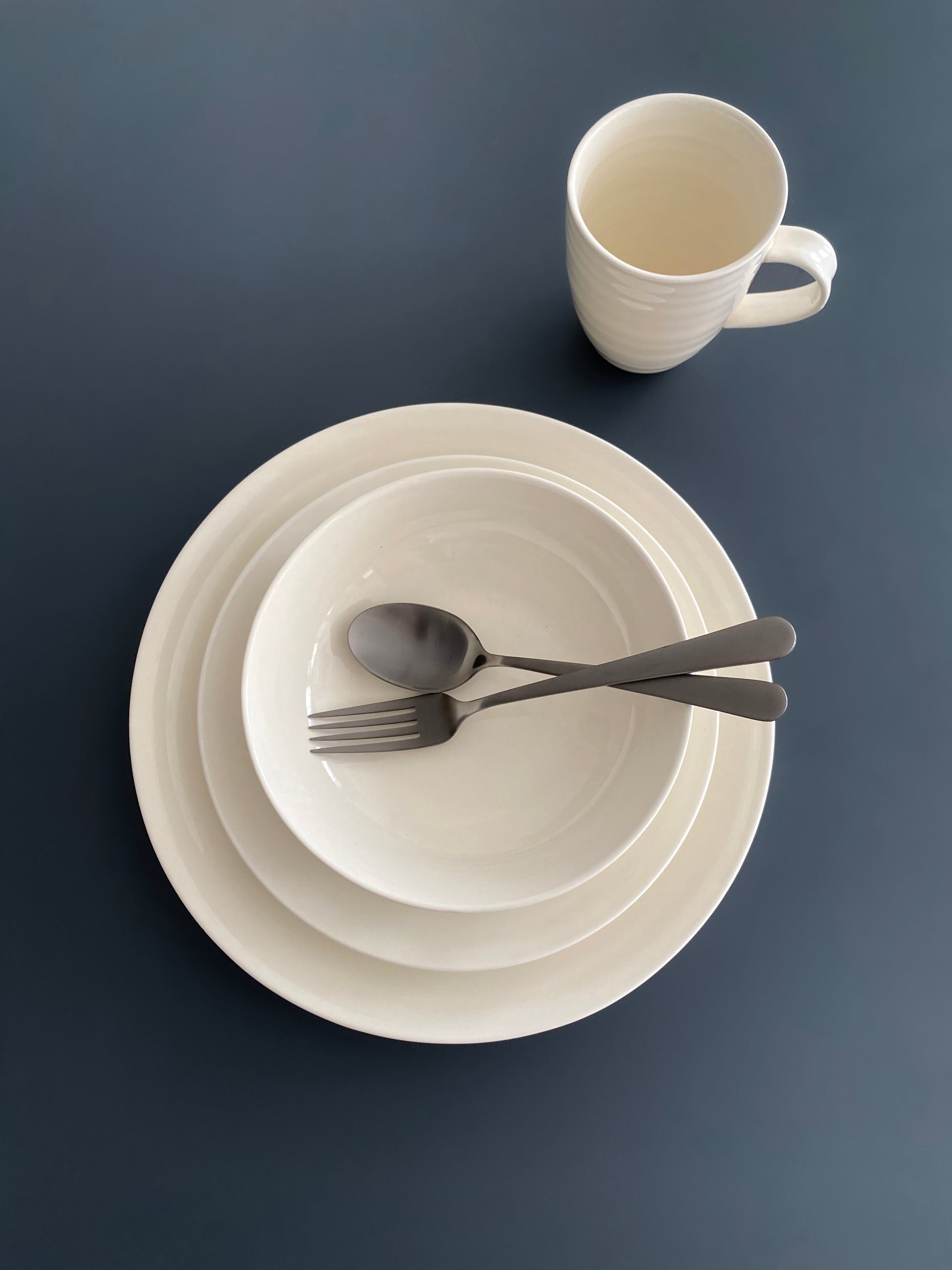 Daniel Smith Mug - Set of 4 - Ivory Canvas Home canvas home, contemporary dinnerware, Daniel Smith, Daniel Smith Collection, dinner party, dinnerware, dinnerware sets, dish sets, family, Ivory, Large, modern dinnerware, Mug, mugs & cups, Place Setting, Plates, simple dinnerware, tabletop, tableware